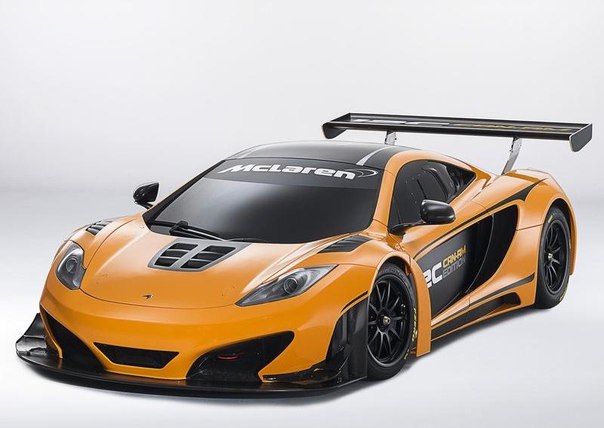 McLaren C122012, новый гоночный автомобиль концепкар. Новый McLaren GT, окрашен в чёрный с оранжевым цветом и смотрится шикарно. 