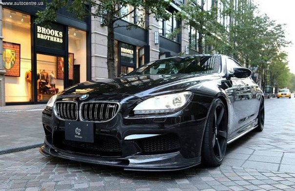 Публике показана заряженная BMW M6 GranCoupe для бизнесменов, подготовленная совместно американским и японским тюнинг-ателье и выполненная в черном цвете.