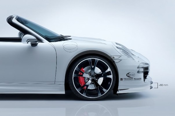 Немецкое тюнинг-ателье TechArt показало полноприводную версию Porsche 911 Carrera в собственном исполнении. В частности, клиренс новинки можно будет увеличить или уменьшить одним нажатием кнопки.