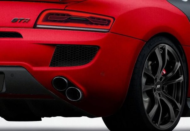 Благодаря специалистам из тюнинг-ателье ABT Sportsline, спортивное купе Audi R8 превратилось в настоящий красный болид.Благодаря специалистам из тюнинг-ателье ABT Sportsline, спортивное купе Audi R8 превратилось в настоящий красный болид.